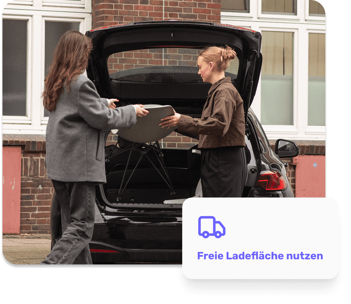 Person packing furniture into a car — using spare cargo space.